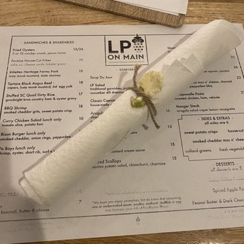 LP On Main - Menu with well adorned silverware - Seafood Near Me - Banner Elk, North Carolina LP On Main - Menu with well adorned silverware - Seafood Near Me - Banner Elk, North Carolina