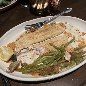Culinary Dropout - amazing rainbow trout with an almond Citrus garnish sauce - New American Near Me - Atlanta, Georgia