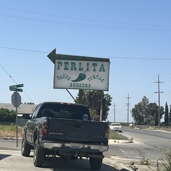 La Perlita Restaurant - a truck parked in front of a restaurant - Mexican Near Me - Corcoran, California La Perlita Restaurant - a truck parked in front of a restaurant - Mexican Near Me - Corcoran, California