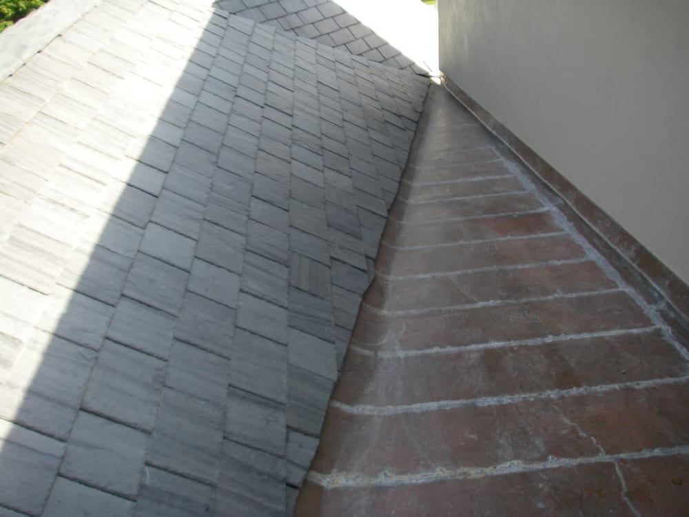 Slide of Sunshine Roofing of SW FL