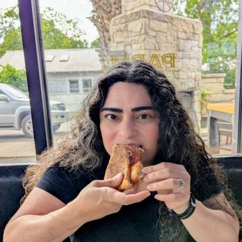 Oribello’s Bar & Kitchen - Me eating a slice of pizza - Sports Bars Near Me - Austin, Texas Oribello’s Bar & Kitchen - Me eating a slice of pizza - Sports Bars Near Me - Austin, Texas