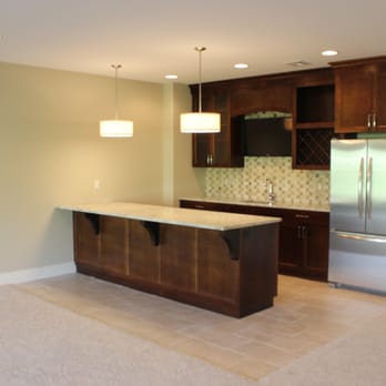 Canterbury Floor and Home - a kitchen with a center island - Flooring Near Me - Manhattan, Kansas Canterbury Floor and Home - a kitchen with a center island - Flooring Near Me - Manhattan, Kansas