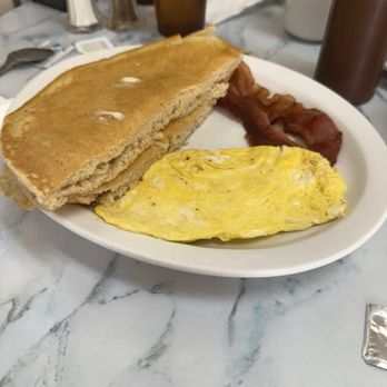Martini’s Cafe - I cut this pancake in 1/2 because it covered the plate! - Coffee & Tea Near Me - Fremont, Nebraska Martini’s Cafe - I cut this pancake in 1/2 because it covered the plate! - Coffee & Tea Near Me - Fremont, Nebraska