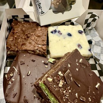 Ganache-d - Top- peanut butter bomb... clockwise starting from top left peanut butter crunch (ahhhhmazing), lemon blueberry, and two mint - Desserts Near Me - Cedar City, Utah