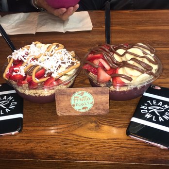 Frutta Bowls - a person holding a drink and a phone - Juice Bars & Smoothies Near Me - Howell, New Jersey Frutta Bowls - a person holding a drink and a phone - Juice Bars & Smoothies Near Me - Howell, New Jersey