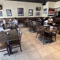 Anthony's Coal Fired Pizza & Wings - Dining room-July 2025. I think the wall art has changed since the last time I was here.