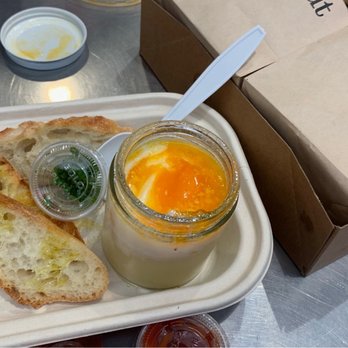 Eggslut - The Slut with lid cover (on the background) - Breakfast & Brunch Near Me - Los Angeles, California Eggslut - The Slut with lid cover (on the background) - Breakfast & Brunch Near Me - Los Angeles, California