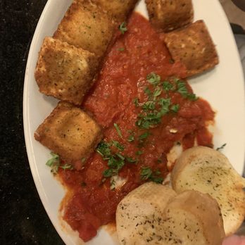 The Mad Greek - Toasted Beef Ravioli and Garlic Bread - Italian Near Me - Lawrence, Kansas The Mad Greek - Toasted Beef Ravioli and Garlic Bread - Italian Near Me - Lawrence, Kansas