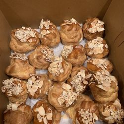 Cakes & Beyond - Custard puffs with caramel and shaved almonds
