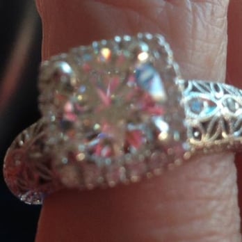Classique Jewelers - This is the new diamond in halo setting that Classique put on the band I upgraded several years ago with them. - Jewelry Near Me - Frisco, Texas Classique Jewelers - This is the new diamond in halo setting that Classique put on the band I upgraded several years ago with them. - Jewelry Near Me - Frisco, Texas