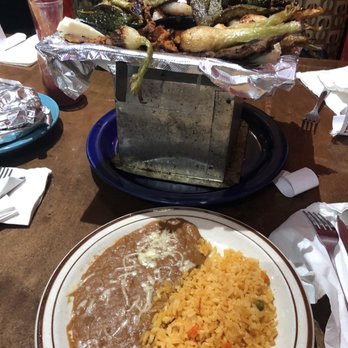 Los Cabos Cantina & Grill - Parrallida comes with rice and beans plate and corn or flour tortillas - Mexican Near Me - Peoria, Illinois Los Cabos Cantina & Grill - Parrallida comes with rice and beans plate and corn or flour tortillas - Mexican Near Me - Peoria, Illinois