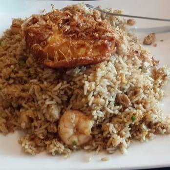 Banana Leaf - Nasi Goreng Kombinasi (chicken and shrimp combination fried rice). That big fried thing you see on top is an egg. - Indonesian Near Me - Temple City, California Banana Leaf - Nasi Goreng Kombinasi (chicken and shrimp combination fried rice). That big fried thing you see on top is an egg. - Indonesian Near Me - Temple City, California
