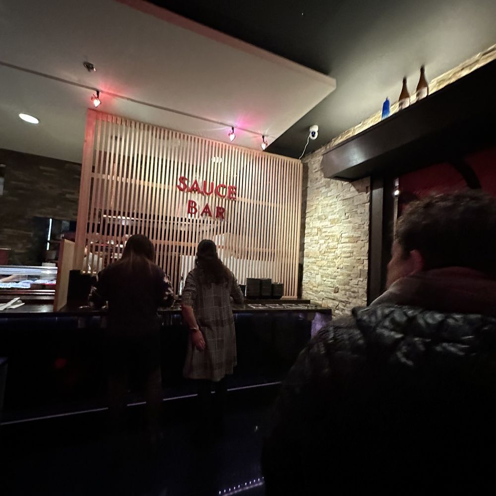 Sushi Motto - people standing at a bar - Japanese Near Me - Anchorage, Alaska Sushi Motto - people standing at a bar - Japanese Near Me - Anchorage, Alaska