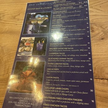 Bar Vanquish - a menu on a table - New American Near Me - Newark, New Jersey