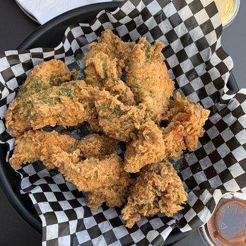 Olivia's Poulet Authentique - a basket of fried chicken - Chicken Shop Near Me - Montreal, Quebec