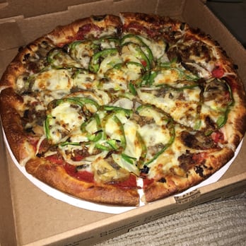 Rainbow Pizza House - a pizza in a cardboard box - Pizza Near Me - Webster, Massachusetts