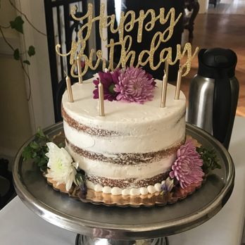Torta Fina Bakeshoppe - Naked cake. Bananas foster inside. We bought the topper and candles. Perfect and delicious! - Bakeries Near Me - Babylon, New York