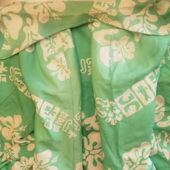 Mercy Vintage - Both sleeves folded over the bad showing how faded they are in comparison to the torso in natural lighting. - Used, Vintage & Consignment Near Me - Oakland, California
