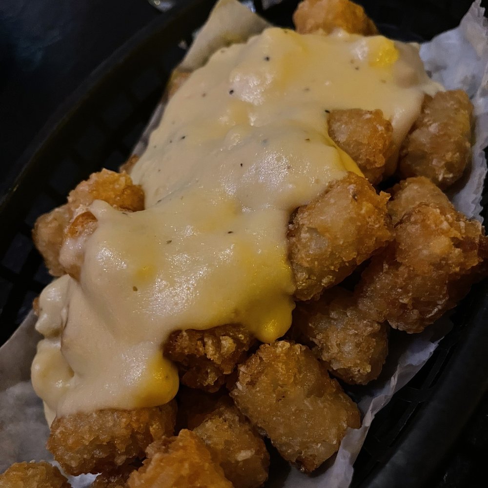 Happy Dog - Tots with white beer cheese fondue - Bars Near Me - Cleveland, Ohio Happy Dog - Tots with white beer cheese fondue - Bars Near Me - Cleveland, Ohio