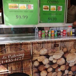 a food truck with a menu on the side a food truck with a menu on the side