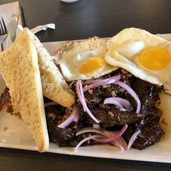 Toast - Vietnamese Pork Chop and Eggs was my husband's order. The pork chops was tender and marinated well. - American Near Me - Sugar Land, Texas