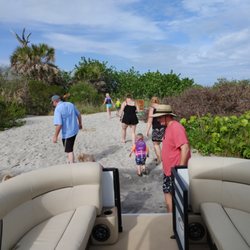 Leaving the boat on one of many potential stops,to look for shells and shark teeth. Stump Pass State Park