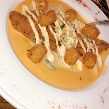 KitchenCray Cafe - Catfish and jalapeño grits with jumbo lump crab meat. With a extra kick of leftover tater tots from the crab tots. - Breakfast & Brunch Near Me - Lanham, Maryland