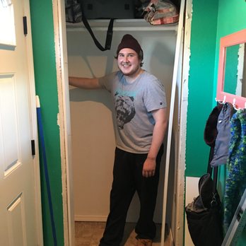 Catalyst Business Maintenance - a man standing in a closet - General Contractors Near Me - Anchorage, Alaska Catalyst Business Maintenance - a man standing in a closet - General Contractors Near Me - Anchorage, Alaska