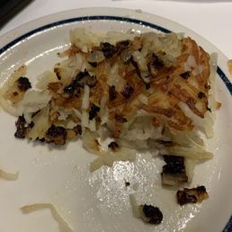 Charred onions pieces in hash browns Charred onions pieces in hash browns
