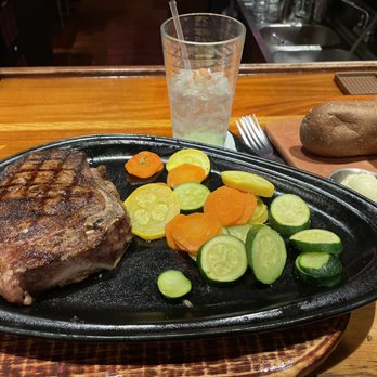 Outback Steakhouse - Bone-In Ribeye* 18 oz.and Fresh Steamed Mixed Veggies - Steakhouses Near Me - Arlington, Texas Outback Steakhouse - Bone-In Ribeye* 18 oz.and Fresh Steamed Mixed Veggies - Steakhouses Near Me - Arlington, Texas