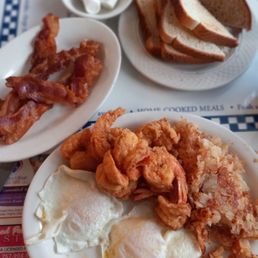Fried Shrim Seafood Combo with hashbrowns, toast and side of bacon