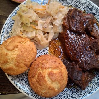 14 Parish Restaurant and Rhum Bar - Oxtail dinner for $38. Cabbage greens need help. Beef was tender, corn muffins were yummy. - Caribbean Near Me - Chicago, Illinois 14 Parish Restaurant and Rhum Bar - Oxtail dinner for $38. Cabbage greens need help. Beef was tender, corn muffins were yummy. - Caribbean Near Me - Chicago, Illinois