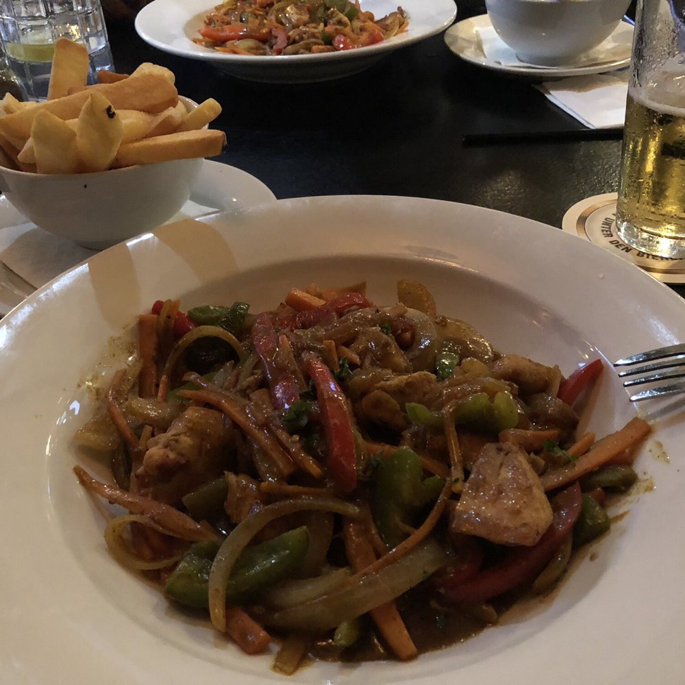 Mick Morgan's - Stir fried curry chicken and vegetables with side of fries - Irish Pub Near Me - Sharon, Massachusetts Mick Morgan's - Stir fried curry chicken and vegetables with side of fries - Irish Pub Near Me - Sharon, Massachusetts
