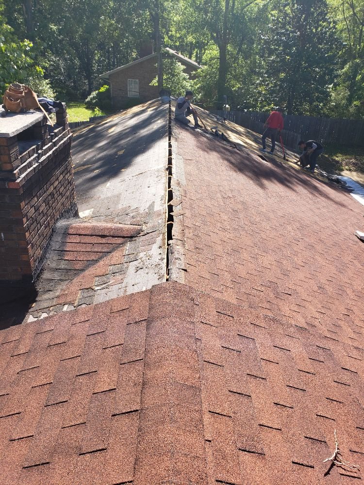 Slide of Ram's Roofing Service