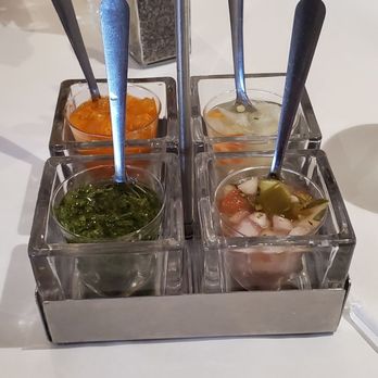 Madrono Restaurant - 4 different sauces - Latin American Near Me - Miami, Florida Madrono Restaurant - 4 different sauces - Latin American Near Me - Miami, Florida