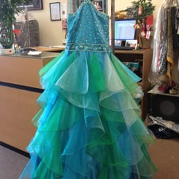 ABC Alterations - This is how it looked when we picked it up. The right side has sun-faded ruffles. ABC altera refuse to pay to replace the dress. - Sewing & Alterations Near Me - Woodstock, Georgia