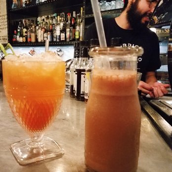 Kobrick Coffee - Best bartender ever (pictured). Super talented and nice fellow. The loca mocha (right) and what's up doc (left). - Cocktail Bars Near Me - New York, New York