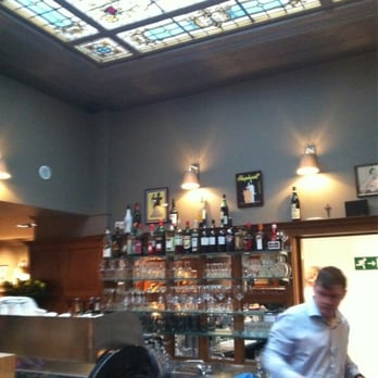 Brasserie Raymond - Bar with stained glass ceiling - Belgian Near Me - Bruges, VWV Brasserie Raymond - Bar with stained glass ceiling - Belgian Near Me - Bruges, VWV