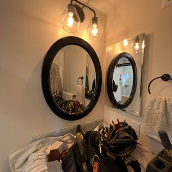 Sanchez Electric - Bathroom sconce light - Electricians Near Me