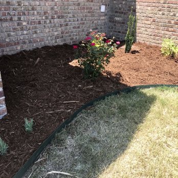 Flores Landscaping - Close up of our flower bed. - Landscaping Near Me