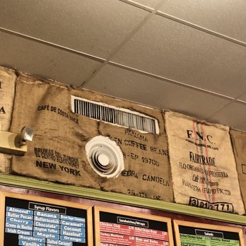 Mr Smith's Coffeehouse - Bags that once held coffee beans as wall decor. - Coffee & Tea Near Me - Sandusky, Ohio