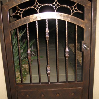 Joe's Custom Iron - The entry door was also made by them - Fences & Gates Near Me Joe's Custom Iron - The entry door was also made by them - Fences & Gates Near Me