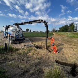 WS Land Clearing - One of our subcontractors daylighting a utility line on a remote property.