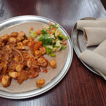Queen Of Sheba - Doro Tibs with Injera - Ethiopian Near Me - New York, New York Queen Of Sheba - Doro Tibs with Injera - Ethiopian Near Me - New York, New York