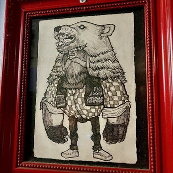 The Pyramid Scheme - a drawing of a bear in a sweater - Bars Near Me - Grand Rapids, Michigan