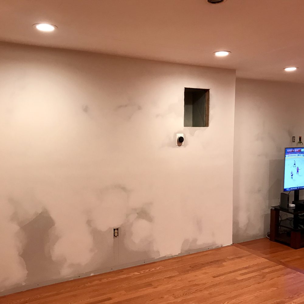After photo #2 Hung drywall on walls. Go Caps!