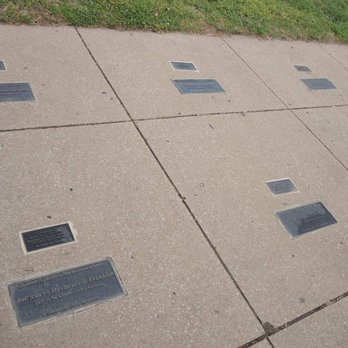 Black Wall Street - Plaques on sidewalk listing which businesses were destroyed during the 1921 Race Massacre - Landmarks & Historical Buildings Near Me - Tulsa, Oklahoma