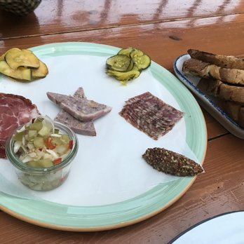 Cindy's Rooftop - Charcuterie board (three meats, but you can opt for five). Comes with pickles, peppers, and grilled bread - New American Near Me - Chicago, Illinois Cindy's Rooftop - Charcuterie board (three meats, but you can opt for five). Comes with pickles, peppers, and grilled bread - New American Near Me - Chicago, Illinois