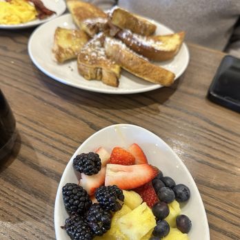 Another Broken Egg Cafe - Classic French Toast with fruit, eggs, and bacon - Breakfast & Brunch Near Me - Miramar Beach, Florida