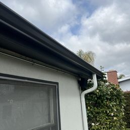 New gutter and downspout New gutter and downspout
